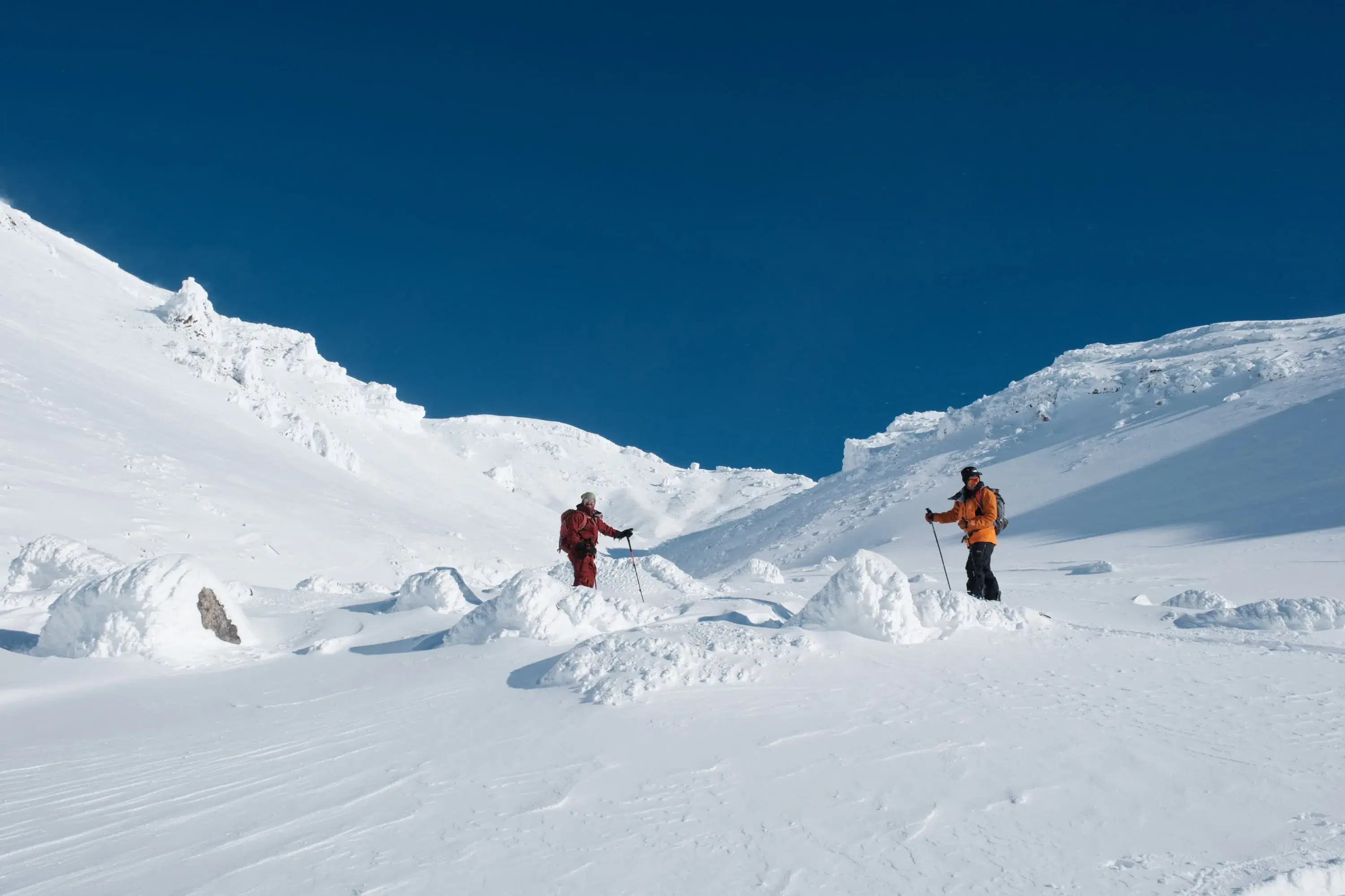 February touring at Asahidake Ski tourers in the Asahidake bowl on a bluebird day