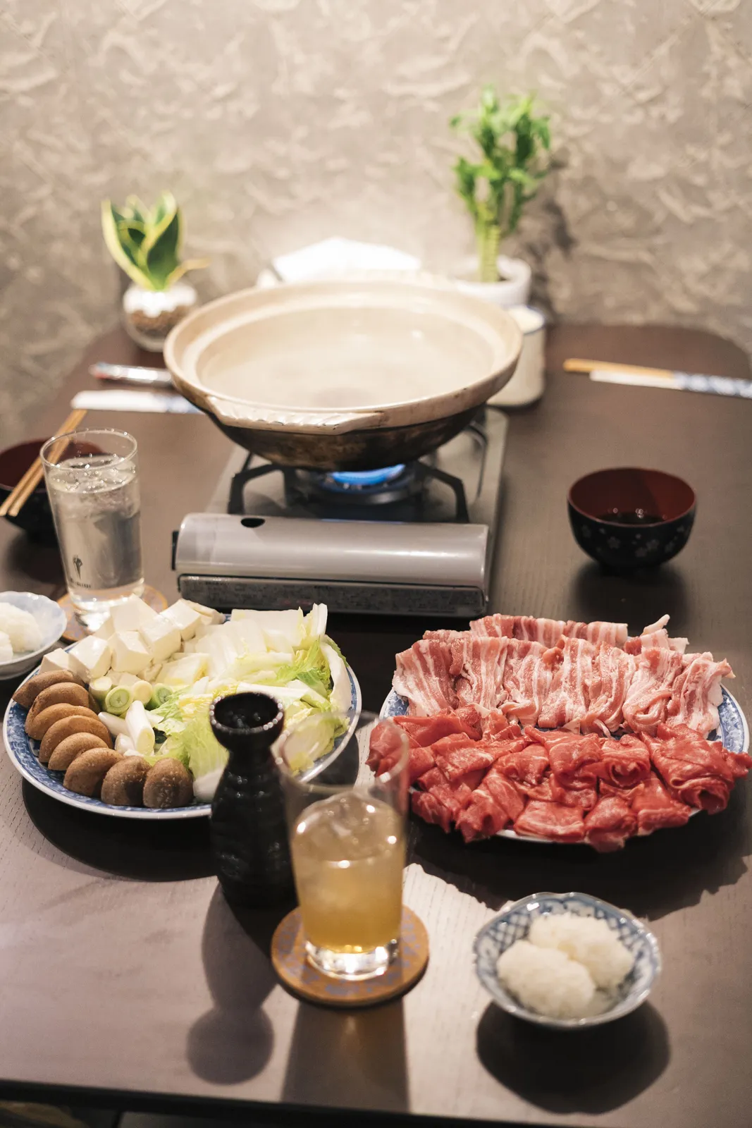 Hot pot dinner with sliced meat and vegetables at the Tokachi Base Club restaurant
